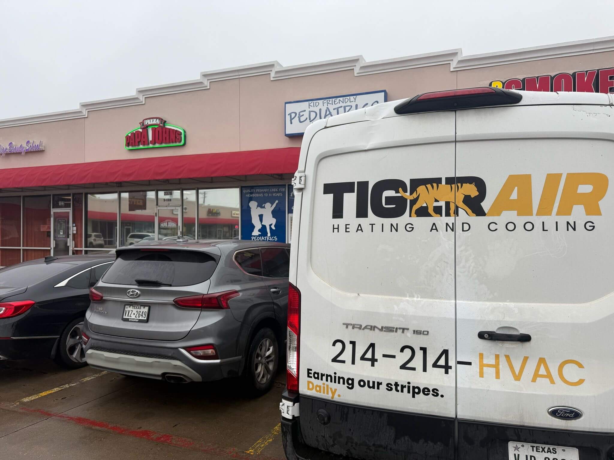 A (#COMPANYNAME} van offering Commercial Services to Taco Bueno